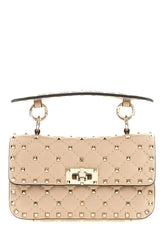 Antiqued pink nappa leather small Rockstud Spike handbag -  | Wise