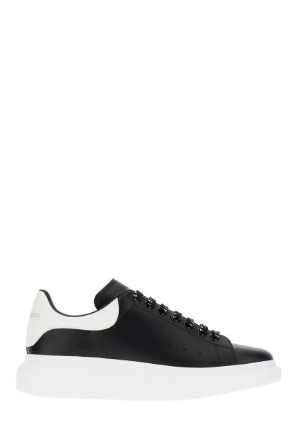 Black leather sneakers with white leather heel