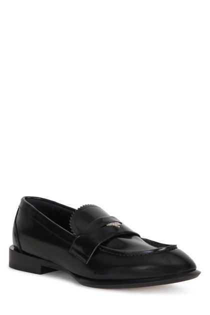 Seal loafers in black leather