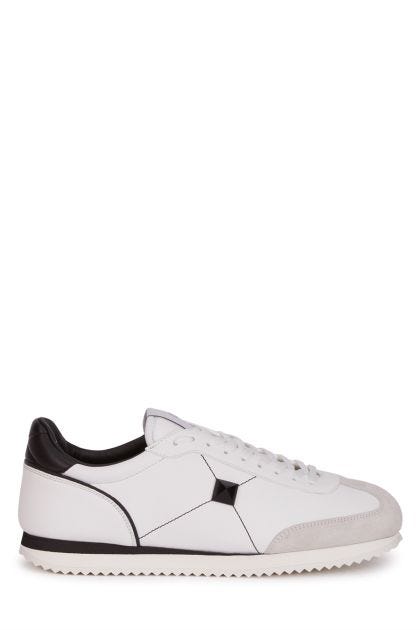 Stud Around sneakers in black and white leather